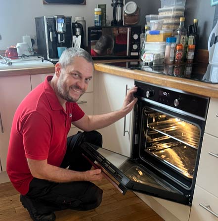 Local oven repair engineer fixing an oven near Stanway